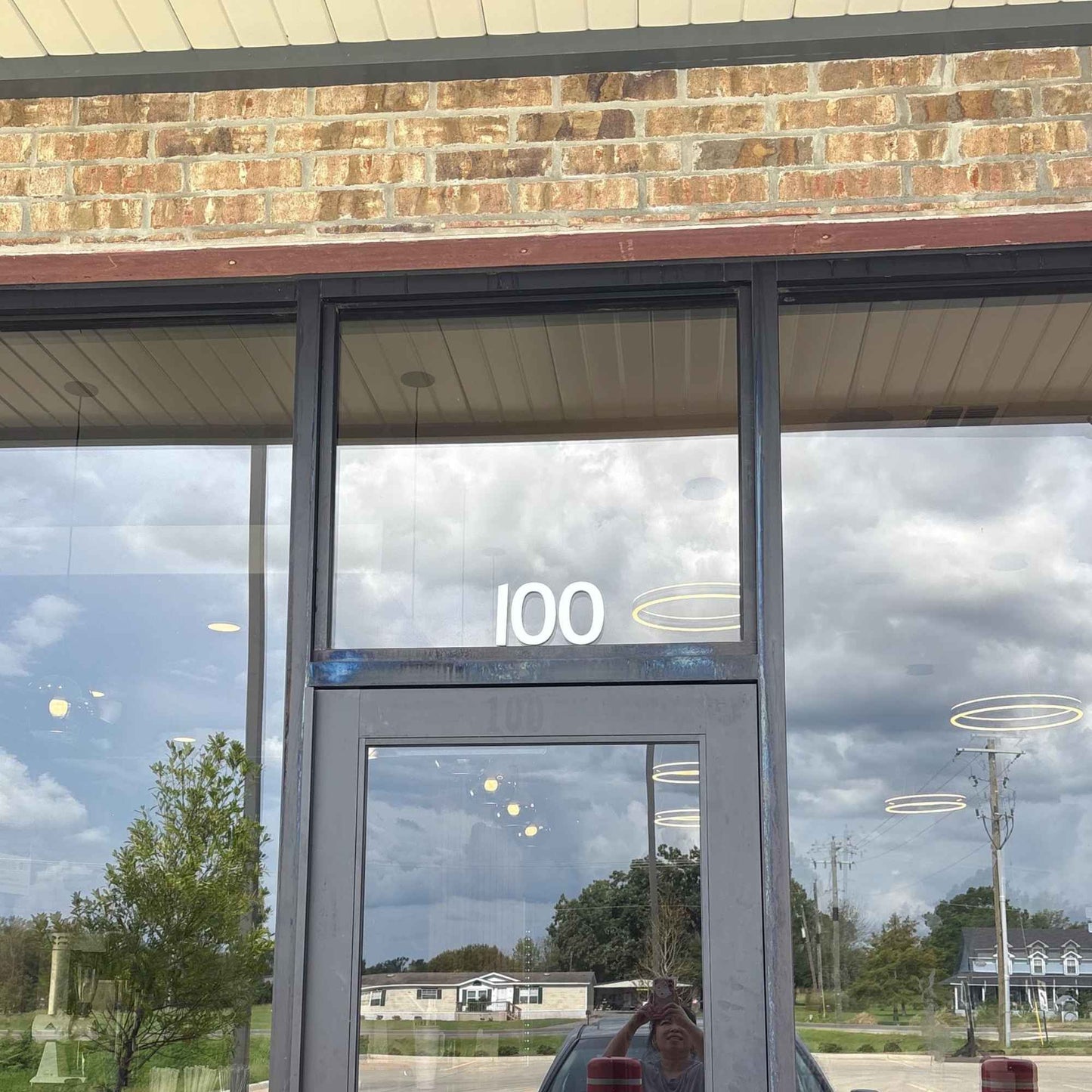 5 inch white CLASSIC MODERN house numbers on glass above door shown