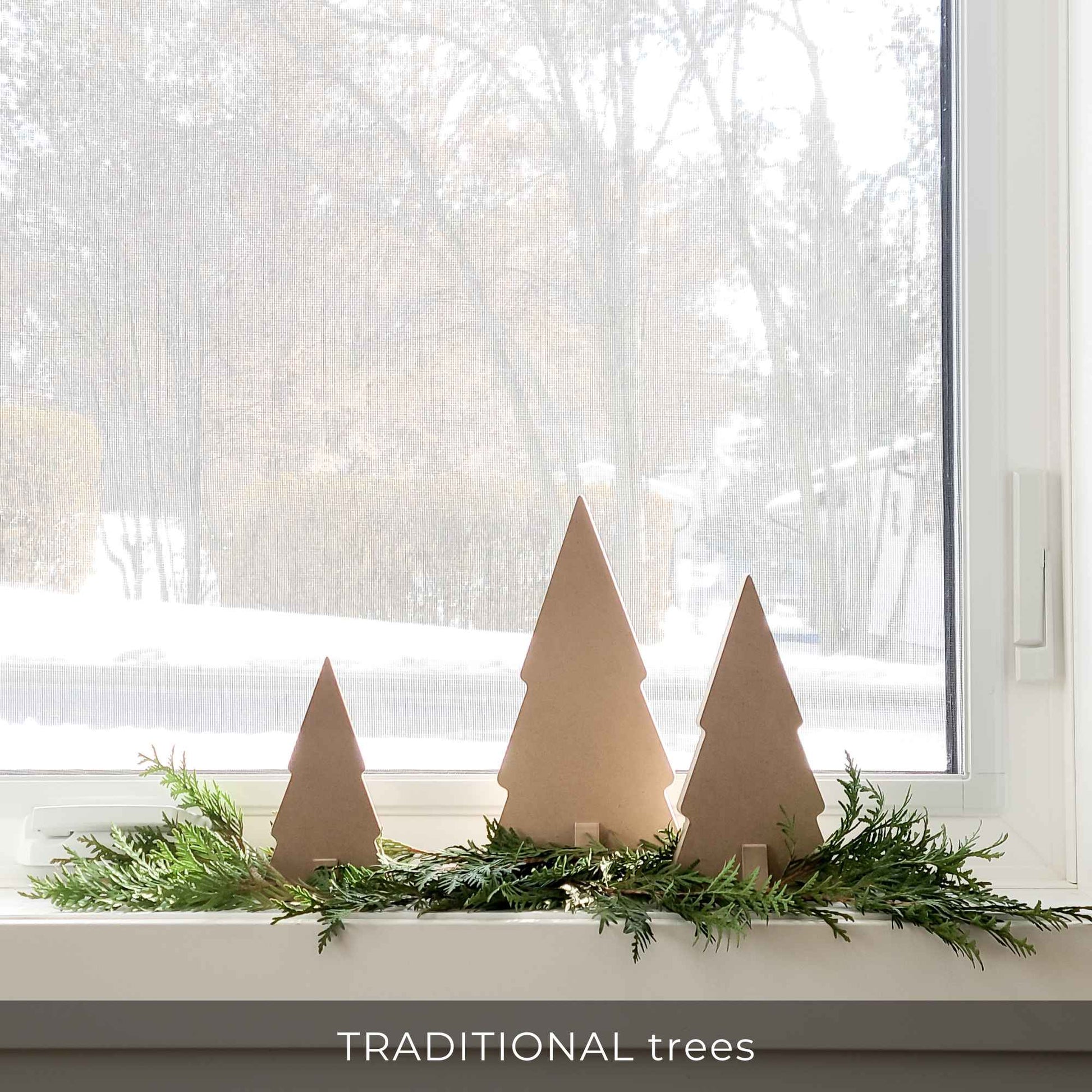 Wooden tree decor on window ledge for simple Christmas decor 