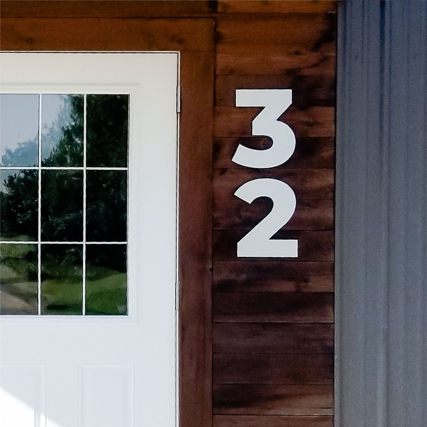 Bold brushed silver house numbers for modern address sign