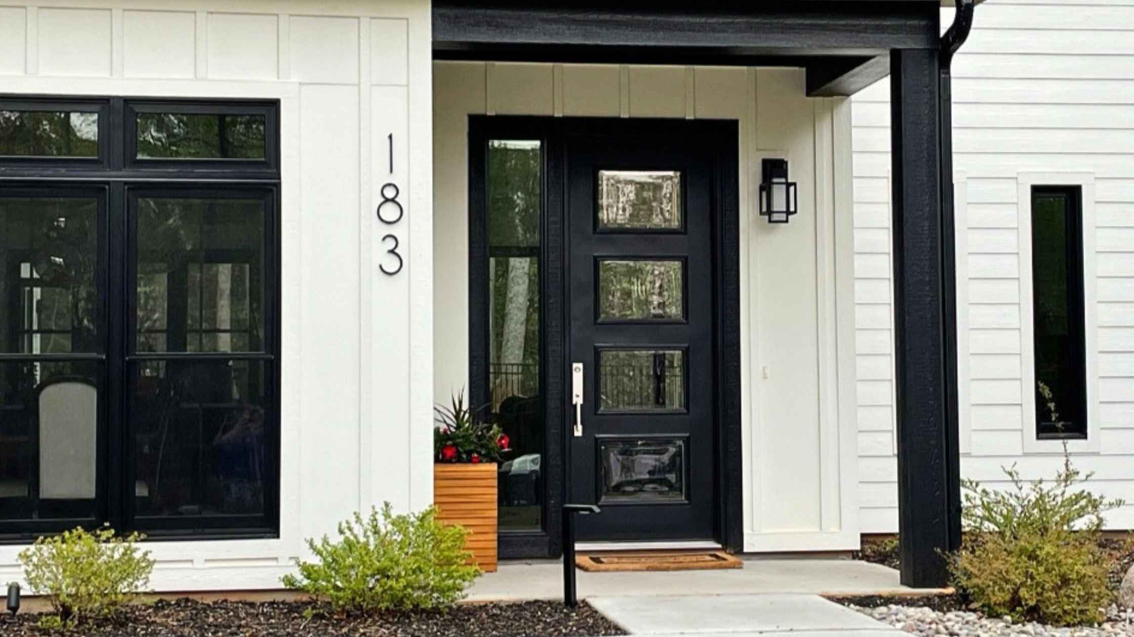 THIN MODERN 8 inch house numbers for a modern address sign on a black and white home. 