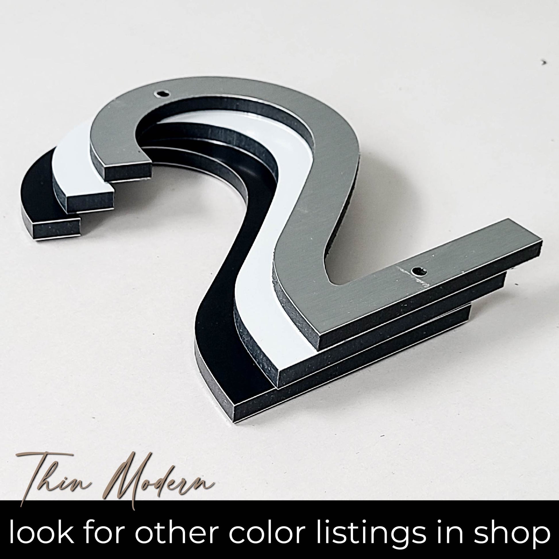 THIN MODERN house numbers available in white black and silver