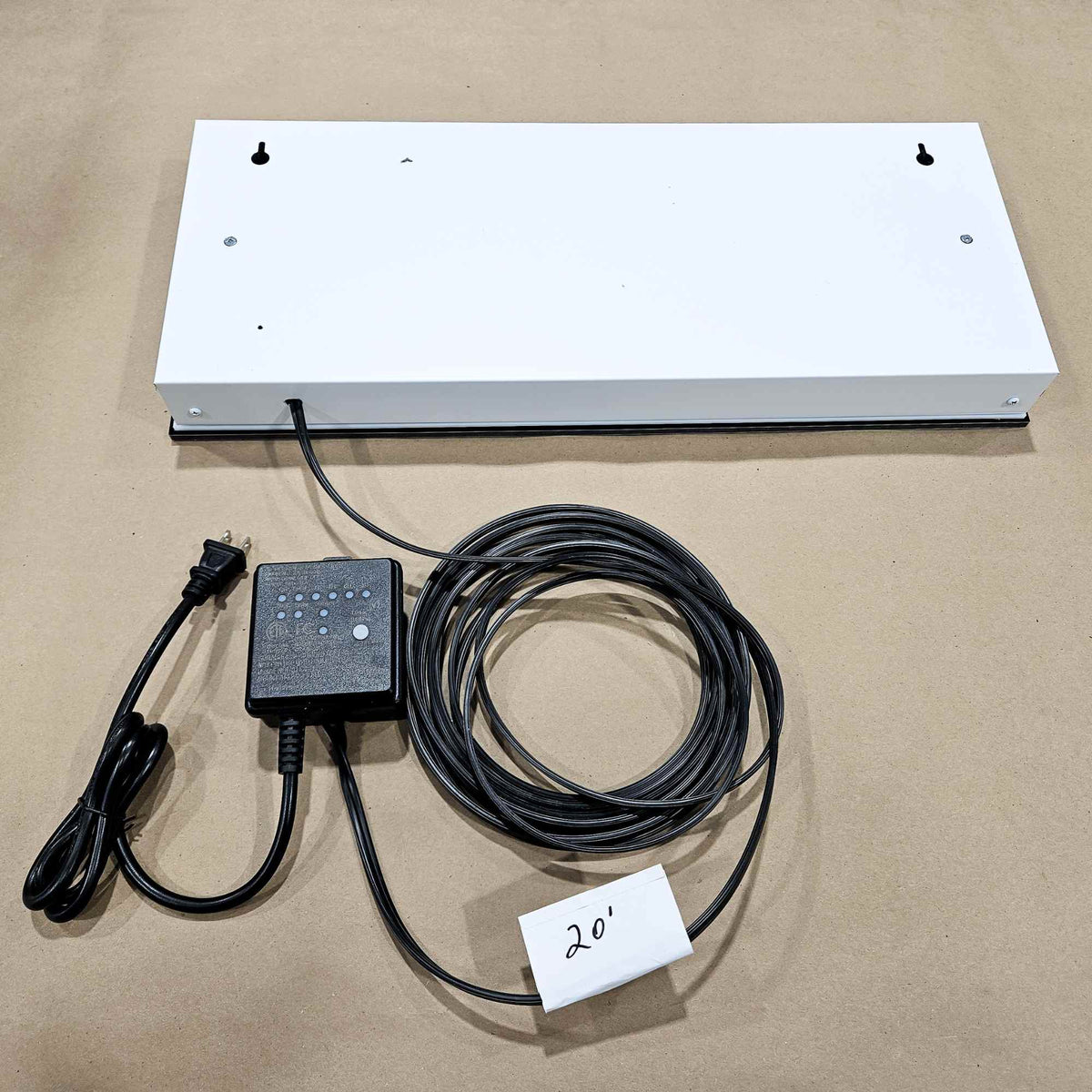 back side of Backlit House number sign with power cable and and light sensor