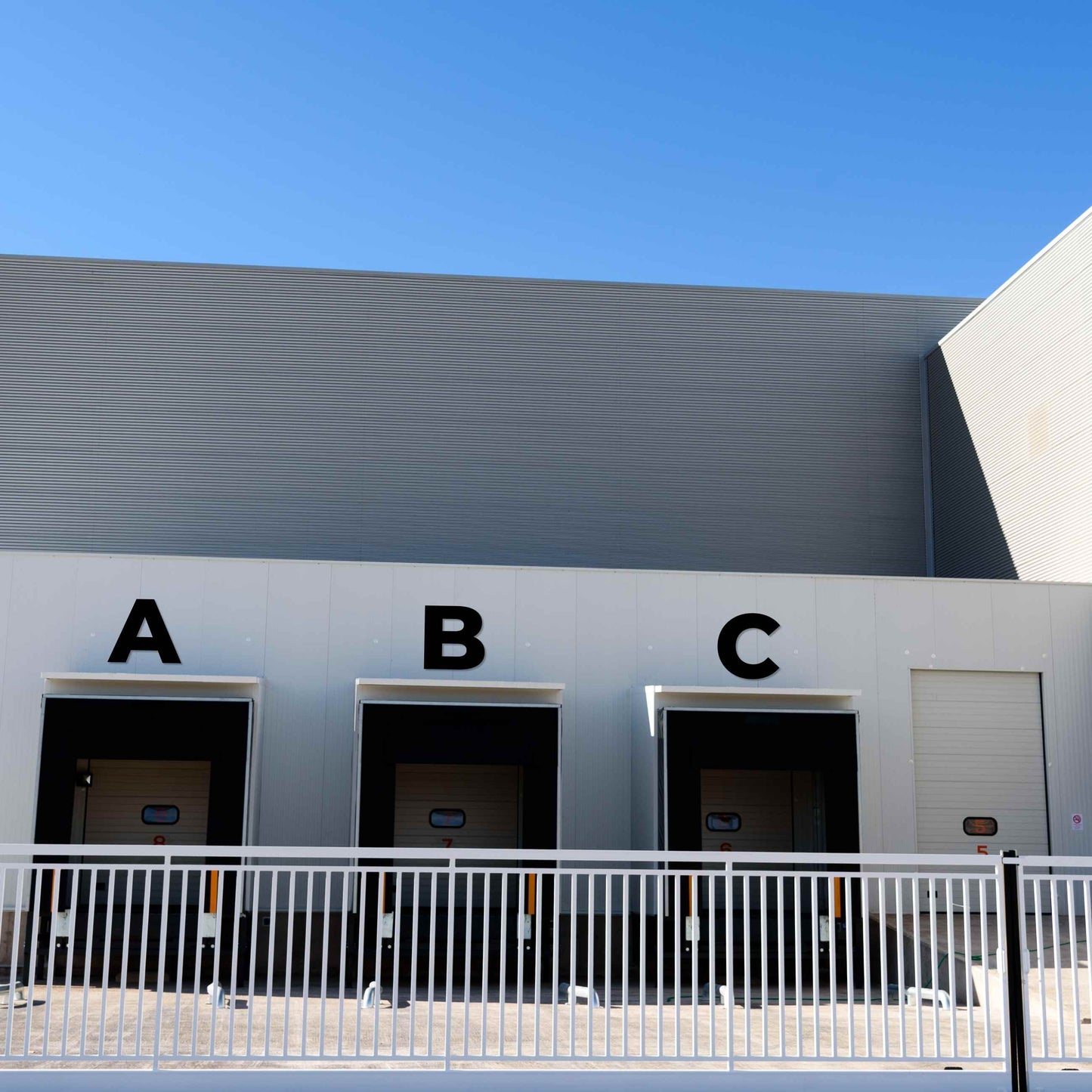 showing how 24 inch BOLD RETRO letters mark commercial doors