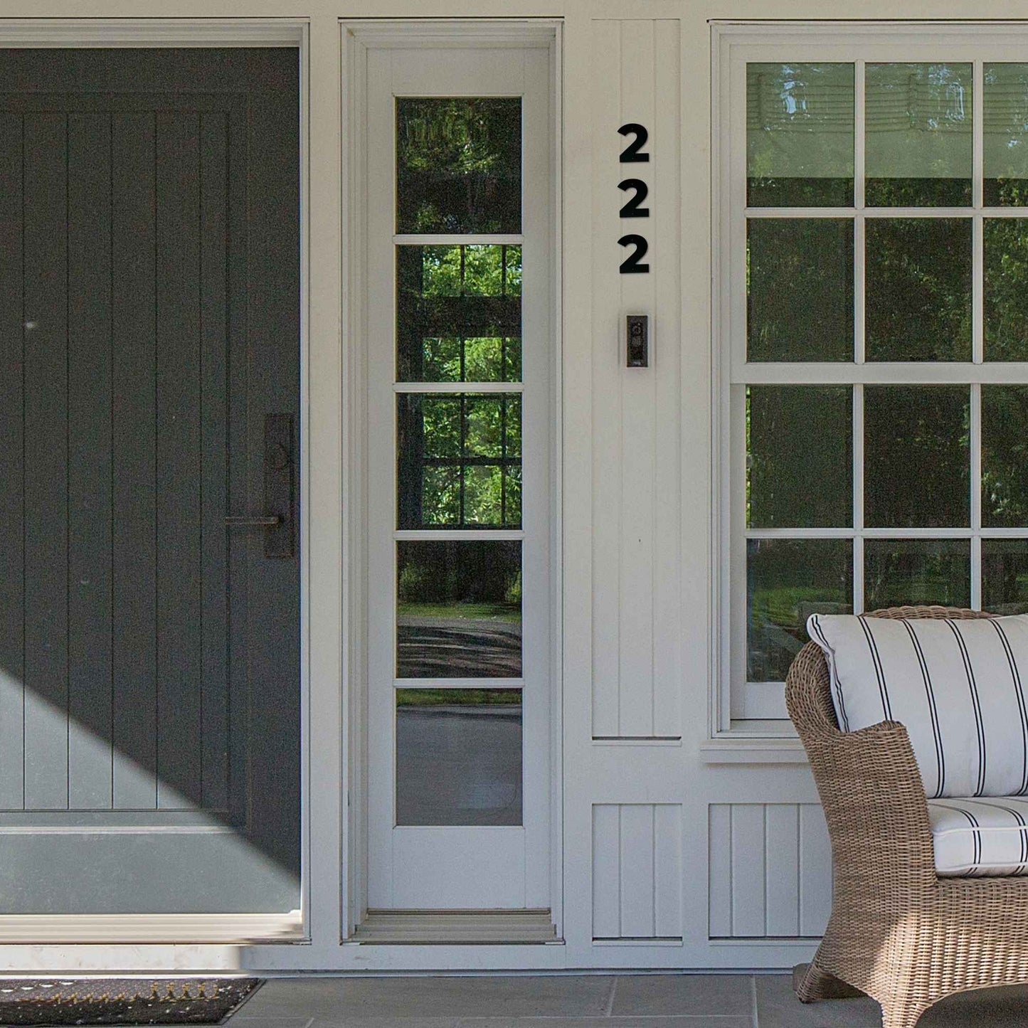 showing a mock up of how 4 inch BOLD RETRO address numbers would look beside a door