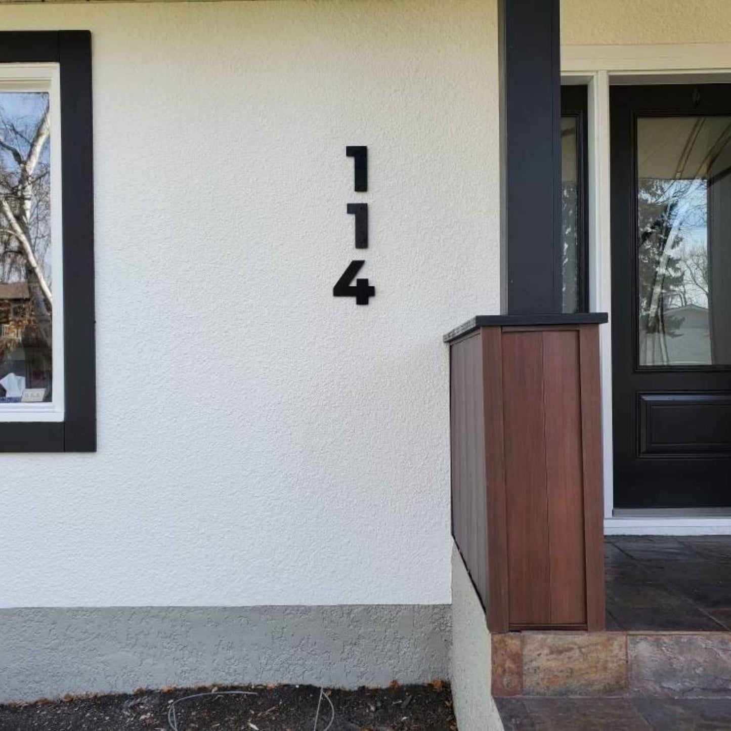 showing 5 nch BOLD RETRO address numbers on white stucco