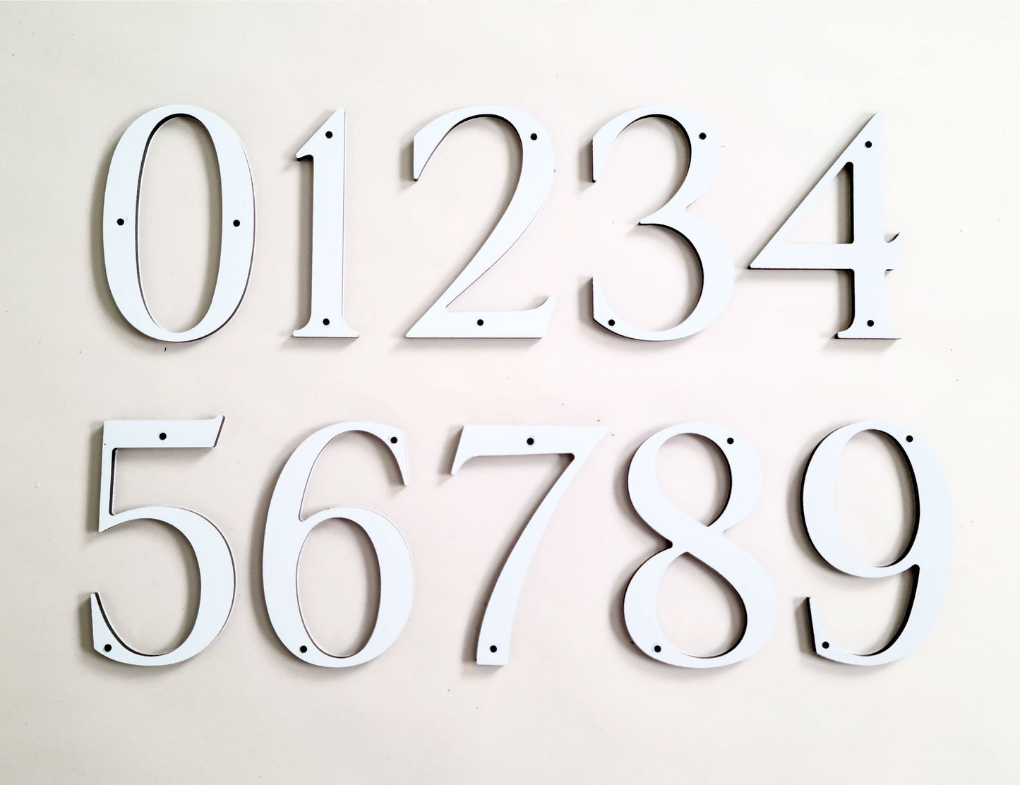 white ROMAN SERIF house numbers
